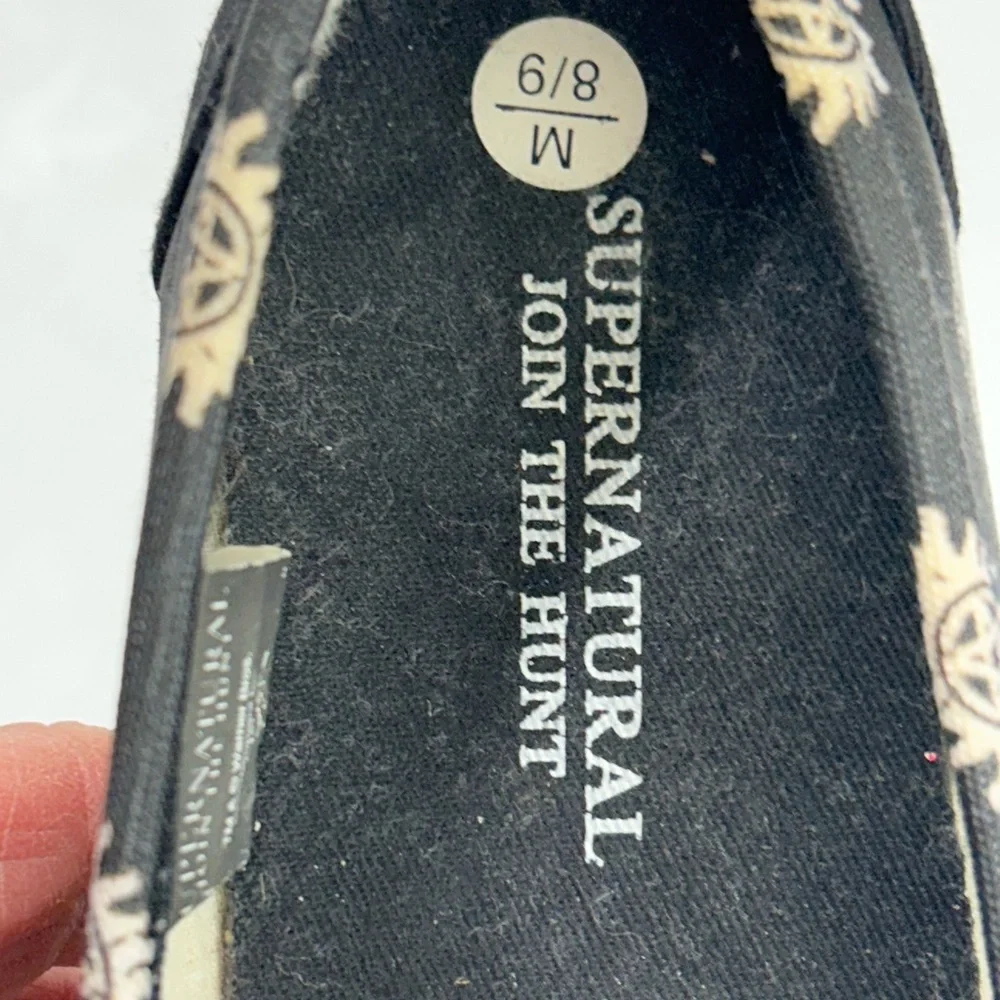 Black Slip-On Shoes with Supernatural Print